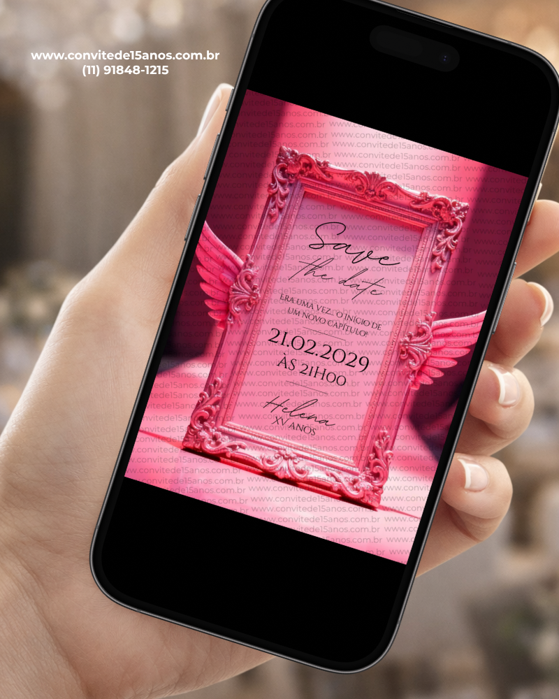 Save the Date Digital Victoria's Secret exibido em celular, com moldura rosa ornamentada, asas decorativas e visual inspirado no universo glamouroso.
