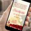 Save the Date Digital A Bela e a Fera para 15 Anos com rosa encantada, pétalas de rosas vermelhas e detalhes em vermelho e dourado.