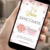 Save the Date Digital Rosa para 15 Anos, com flores delicadas, detalhes dourados, borboletas e design elegante para debutante.